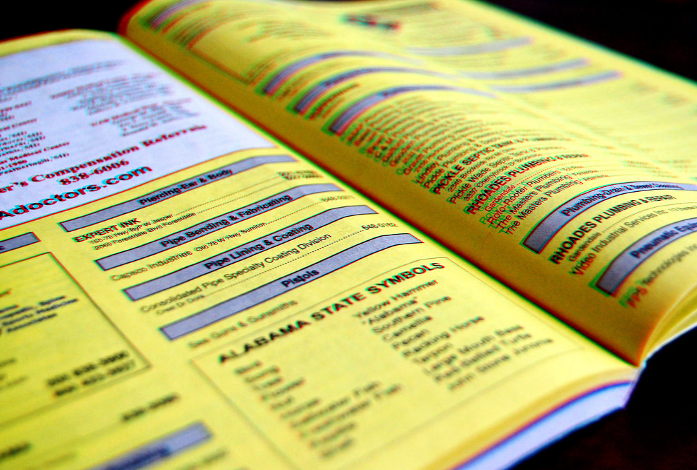livro de páginas amarelas, com o efeito 3D de sempre